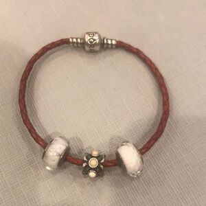 Pandora red leather bracelet with three charms